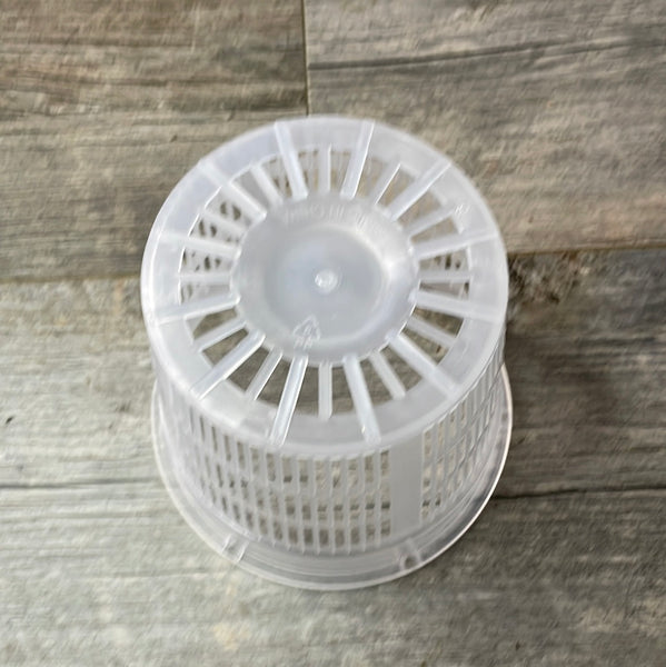 bottom view of a clear round mesh orchid pot