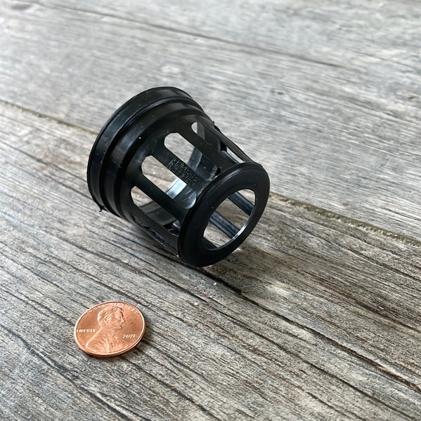 a 1 5/8" tiny black net pot with a penny for size - bottom view showing a big hole for drainage