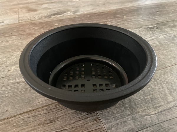 side view of a 7" black textured plastic bulb pan