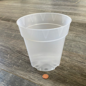 a side way view of a clear round 6" tall orchid pot