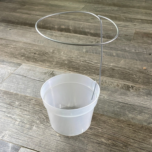 an 8 inch adjustable ring stake attached to a clear plastic orchid pot